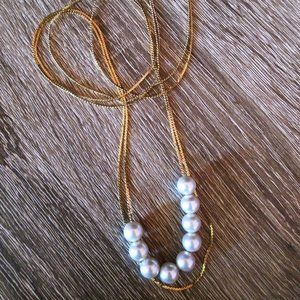 Gold tone faux pearl two strand necklace